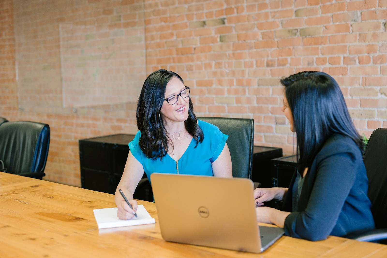 Recruitment team reviewing candidate profiles in a meeting