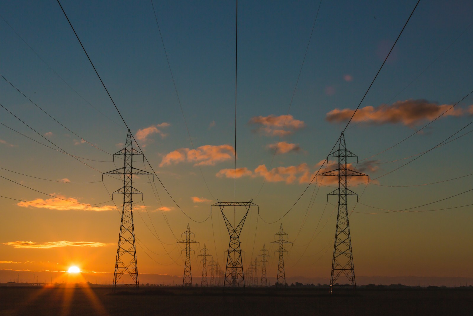 Engineer reviewing renewable energy grid infrastructure
